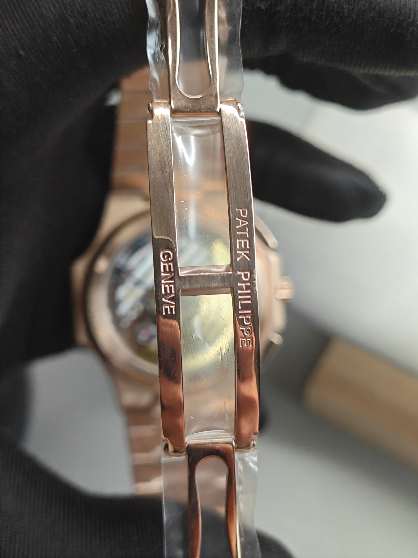 Patek Philippe Nautilus Travel Time Chronograph 5990/1R-001 in Rose Gold with Blue Sunburst Dial