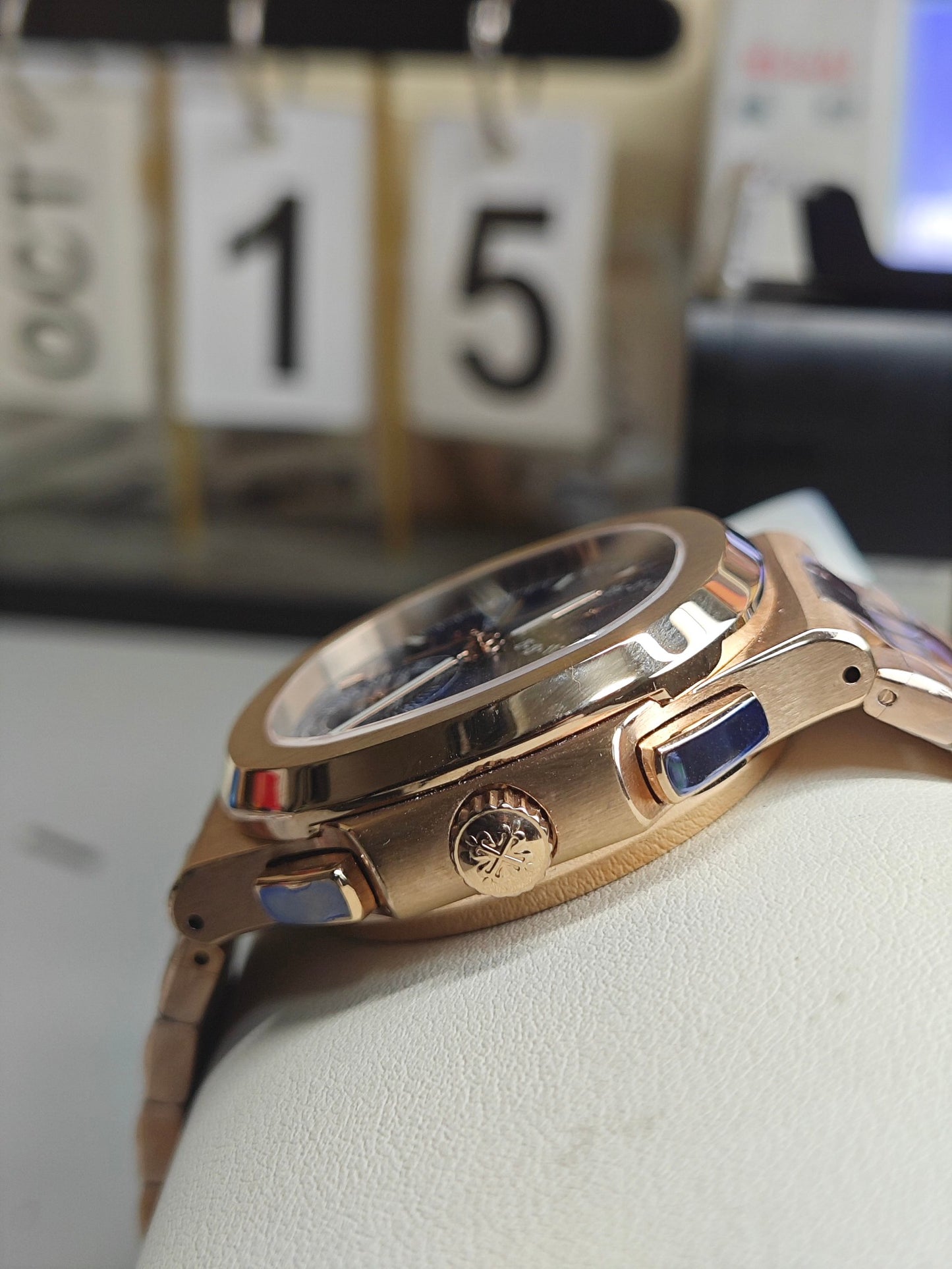 Patek Philippe Nautilus Travel Time Chronograph 5990/1R-001 in Rose Gold with Blue Sunburst Dial