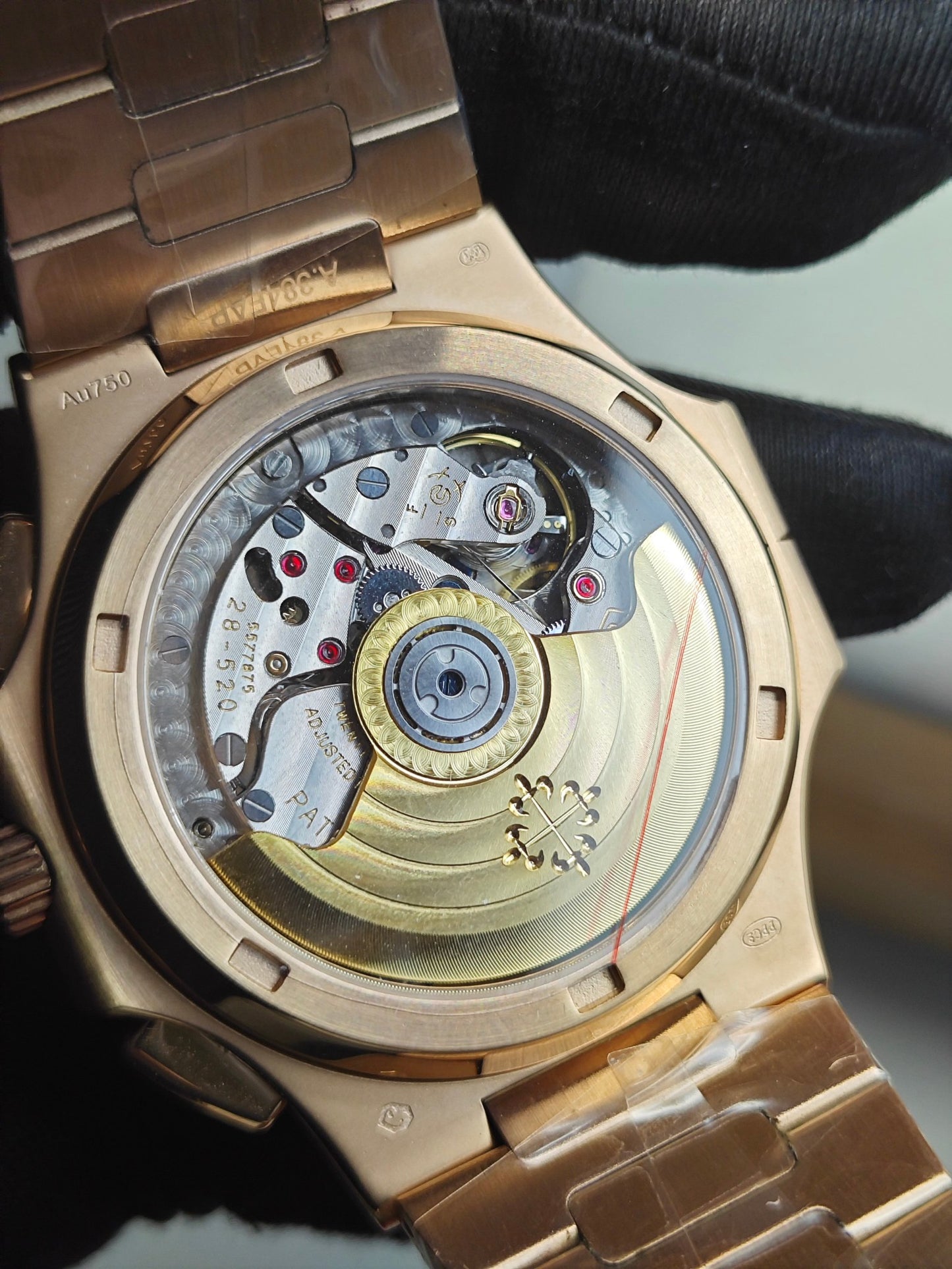 Patek Philippe Nautilus Travel Time Chronograph 5990/1R-001 in Rose Gold with Blue Sunburst Dial