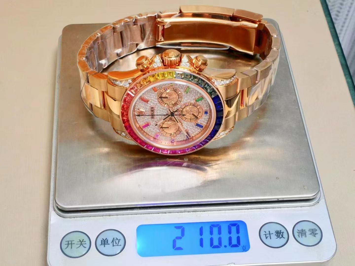 Rolex Cosmograph Daytona 116595RBOW 18K Everose Gold, Rainbow Sapphire Bezel, Diamond-Set Case & Pavé Dial