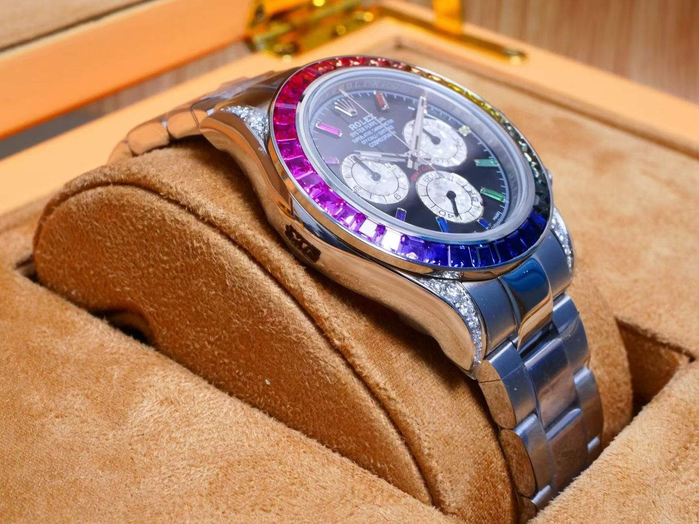 Rolex Oyster Perpetual Cosmograph Daytona White Gold, Diamond-Paved Dial, Rainbow Baguette Sapphire Bezel