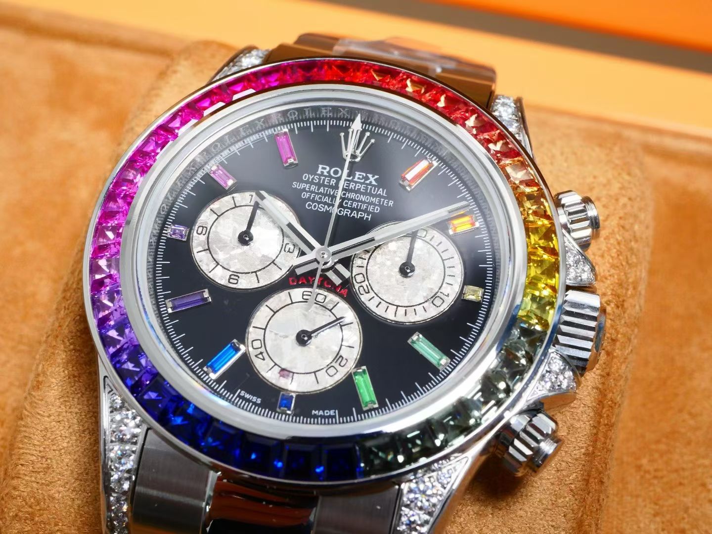 Rolex Oyster Perpetual Cosmograph Daytona White Gold, Diamond-Paved Dial, Rainbow Baguette Sapphire Bezel