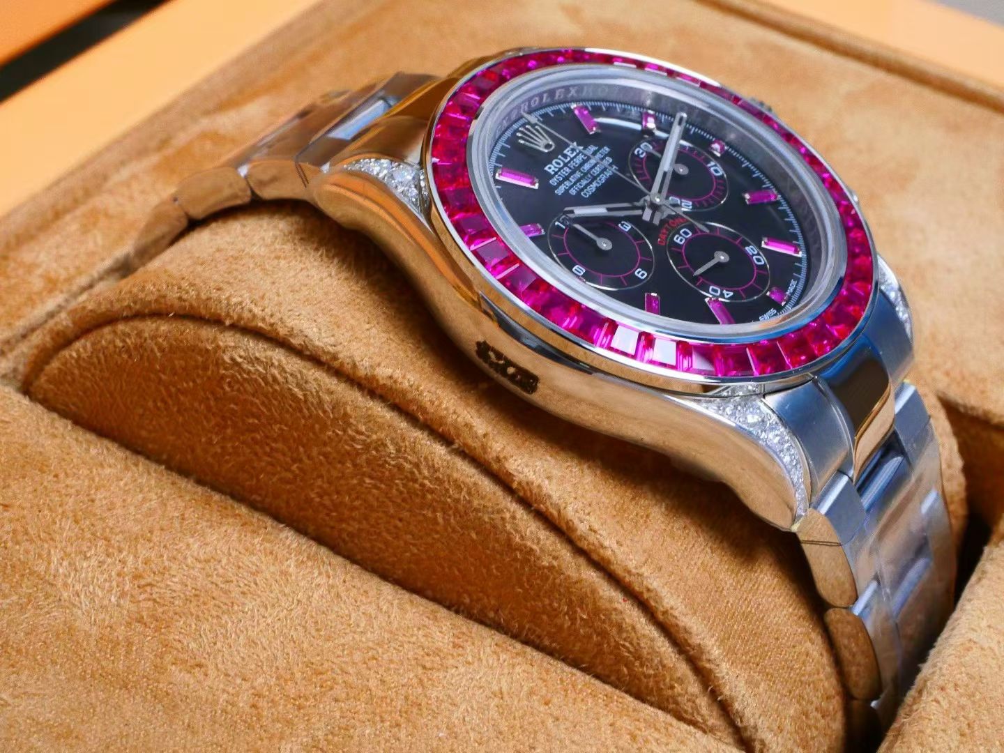 Rolex Cosmograph Daytona – 18K White Gold, Black Dial, Ruby Bezel & Diamond Lugs