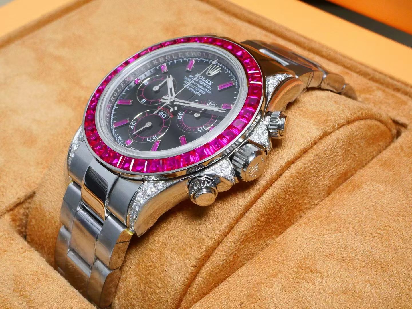 Rolex Cosmograph Daytona – 18K White Gold, Black Dial, Ruby Bezel & Diamond Lugs