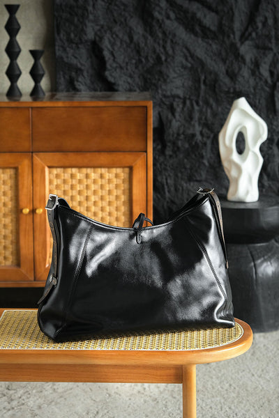 Louis Vuitton CarryAll Vibe MM Handbag – Black Lambskin Leather