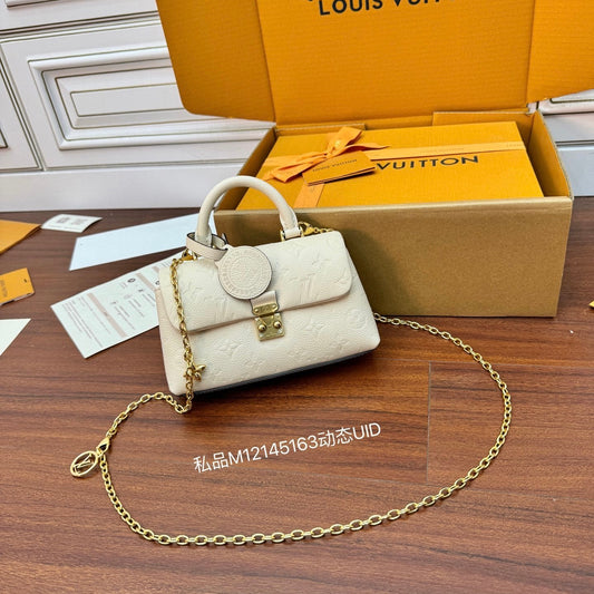 Louis Vuitton Nano Madeleine Bag in Crème Monogram Empreinte Leather