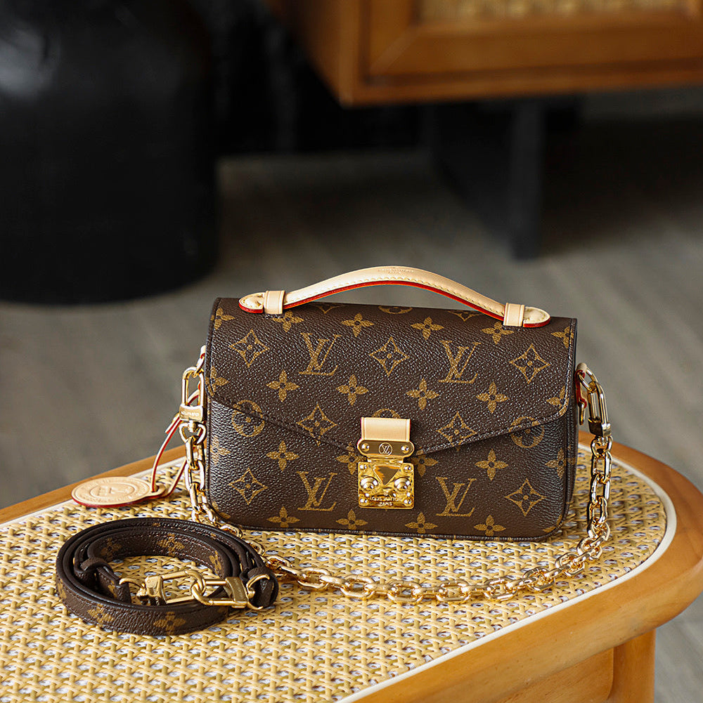 Louis Vuitton Pochette Métis East West Bag Monogram Canvas with Cowhide Leather & Gold Hardware
