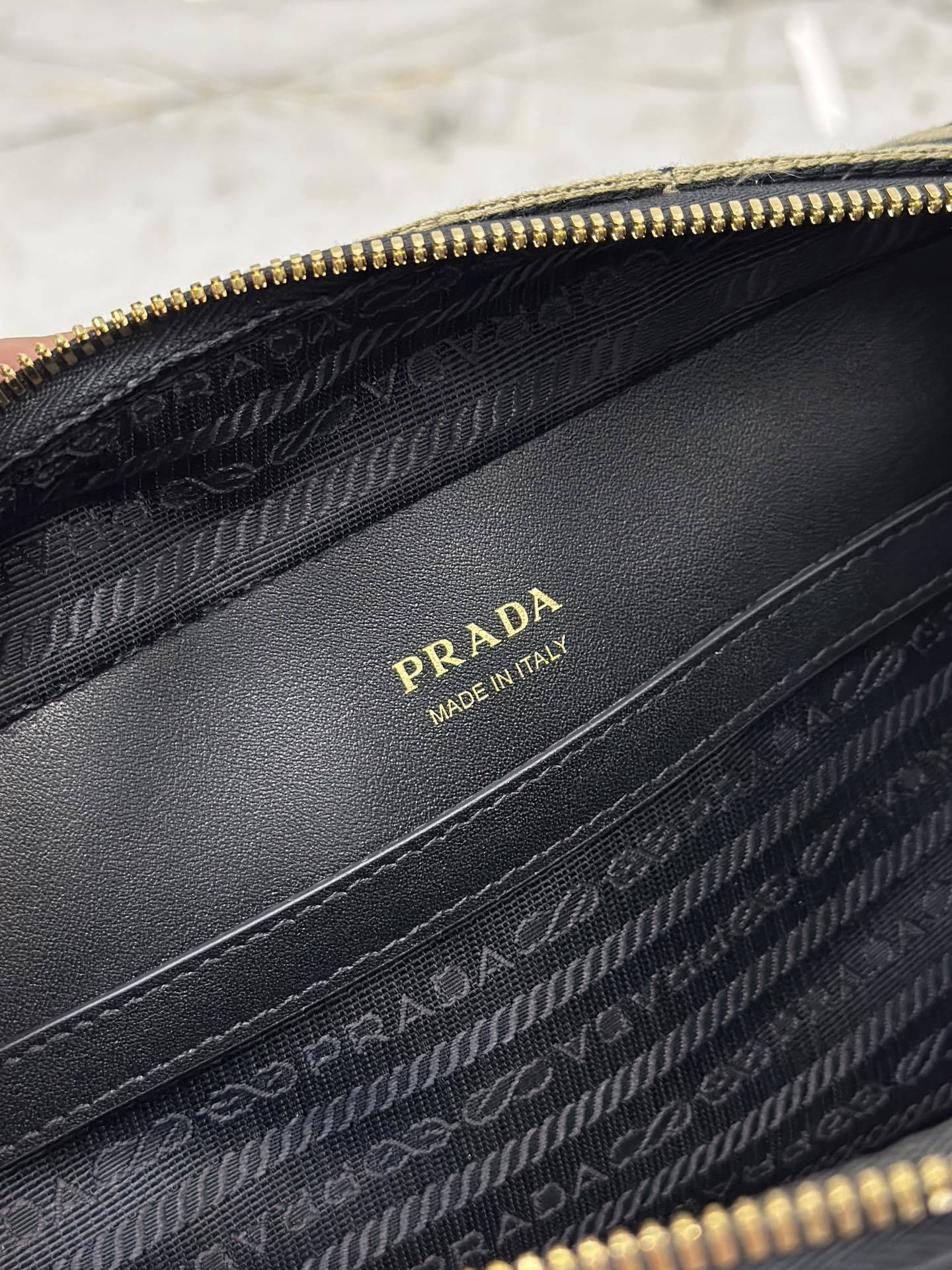 Prada Symbole Embroidered Fabric Messenger Bag in Black and Beige