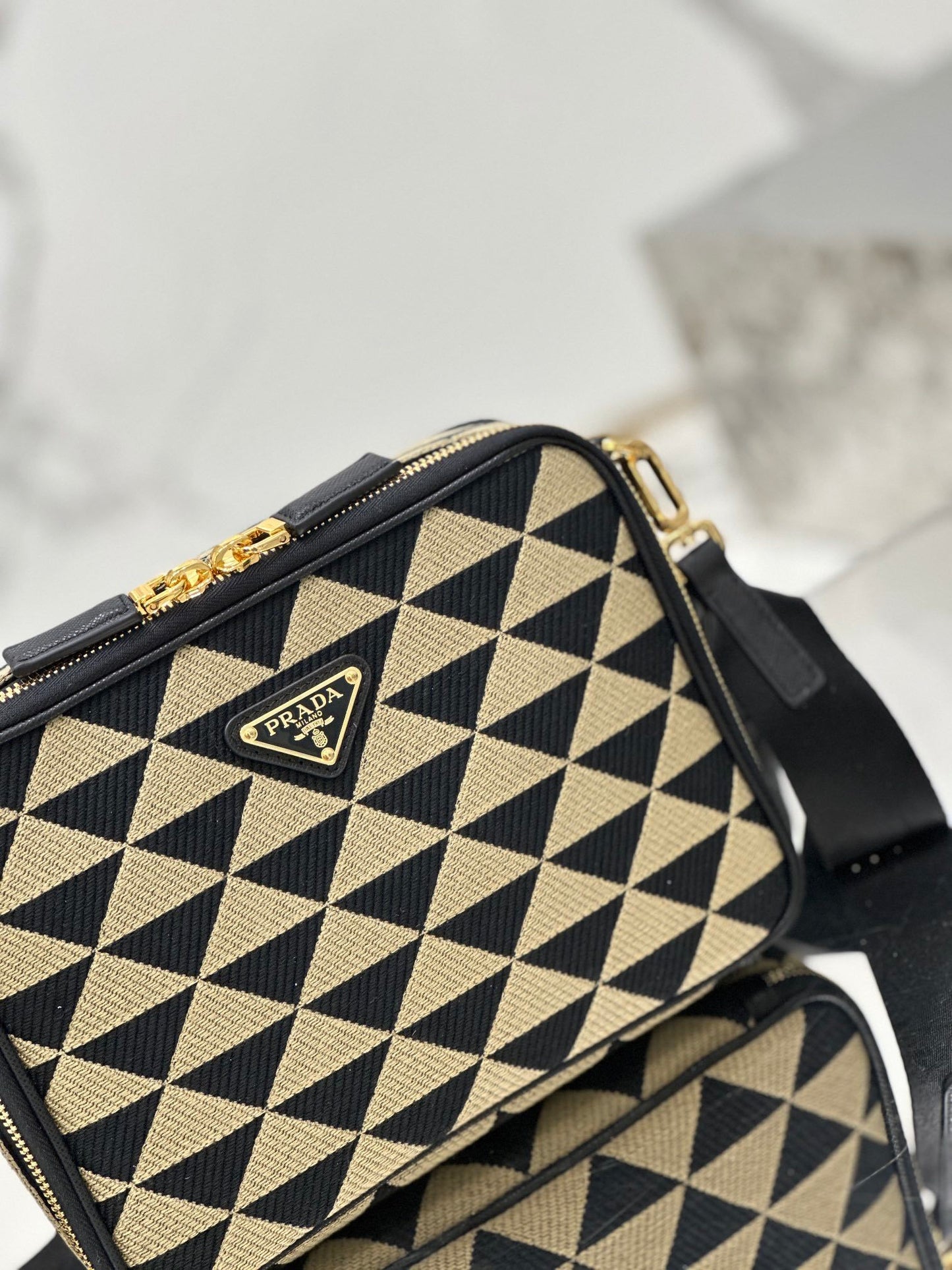 Prada Symbole Embroidered Fabric Messenger Bag in Black and Beige