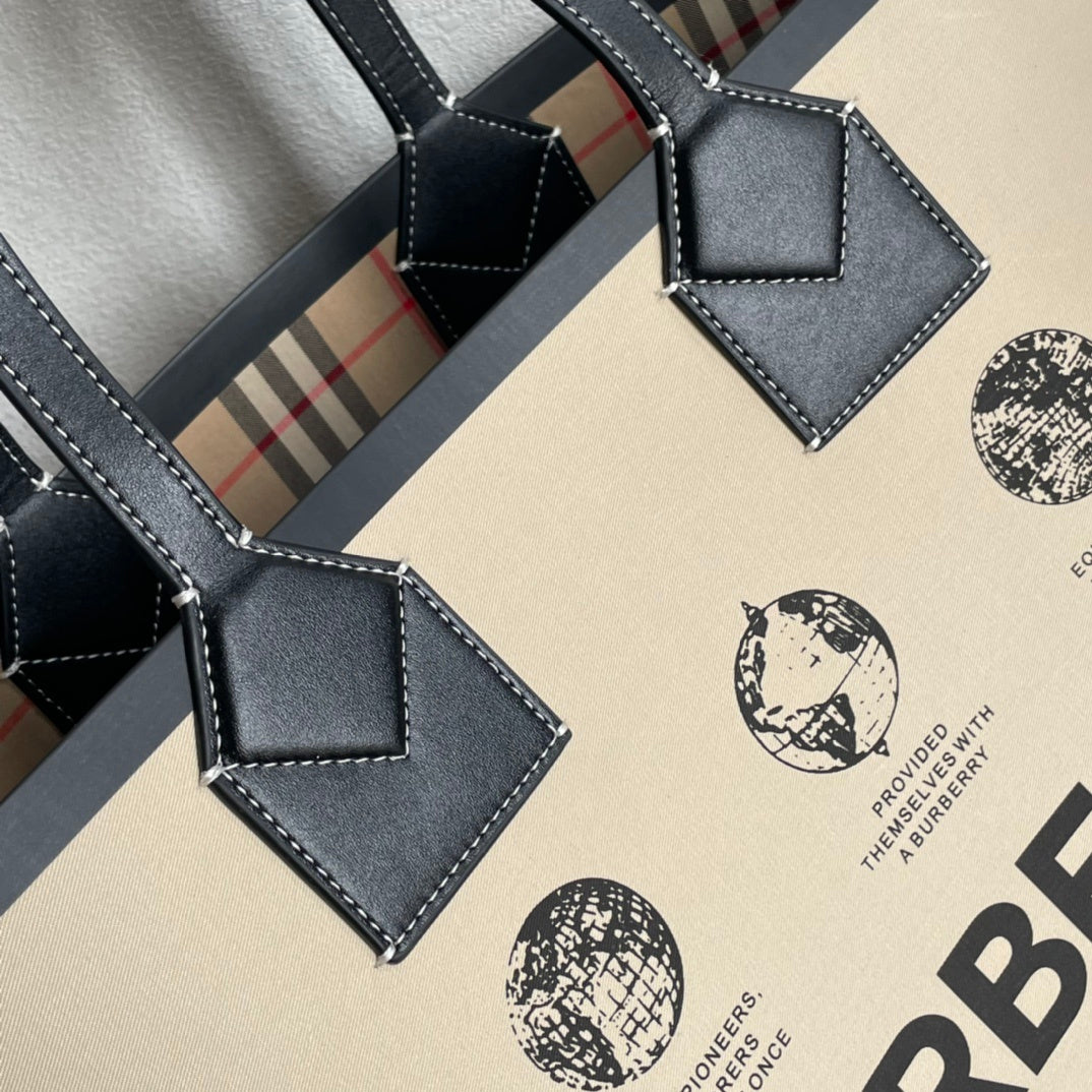 Burberry Label Print Cotton Medium London Tote Bag in beige and black, featuring leather trim and contrast stitching