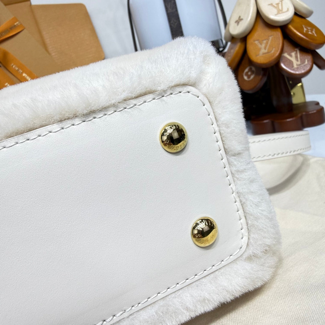Louis Vuitton Capusnow Top-Handle Bag in Shearling with Removable Pompom Charm