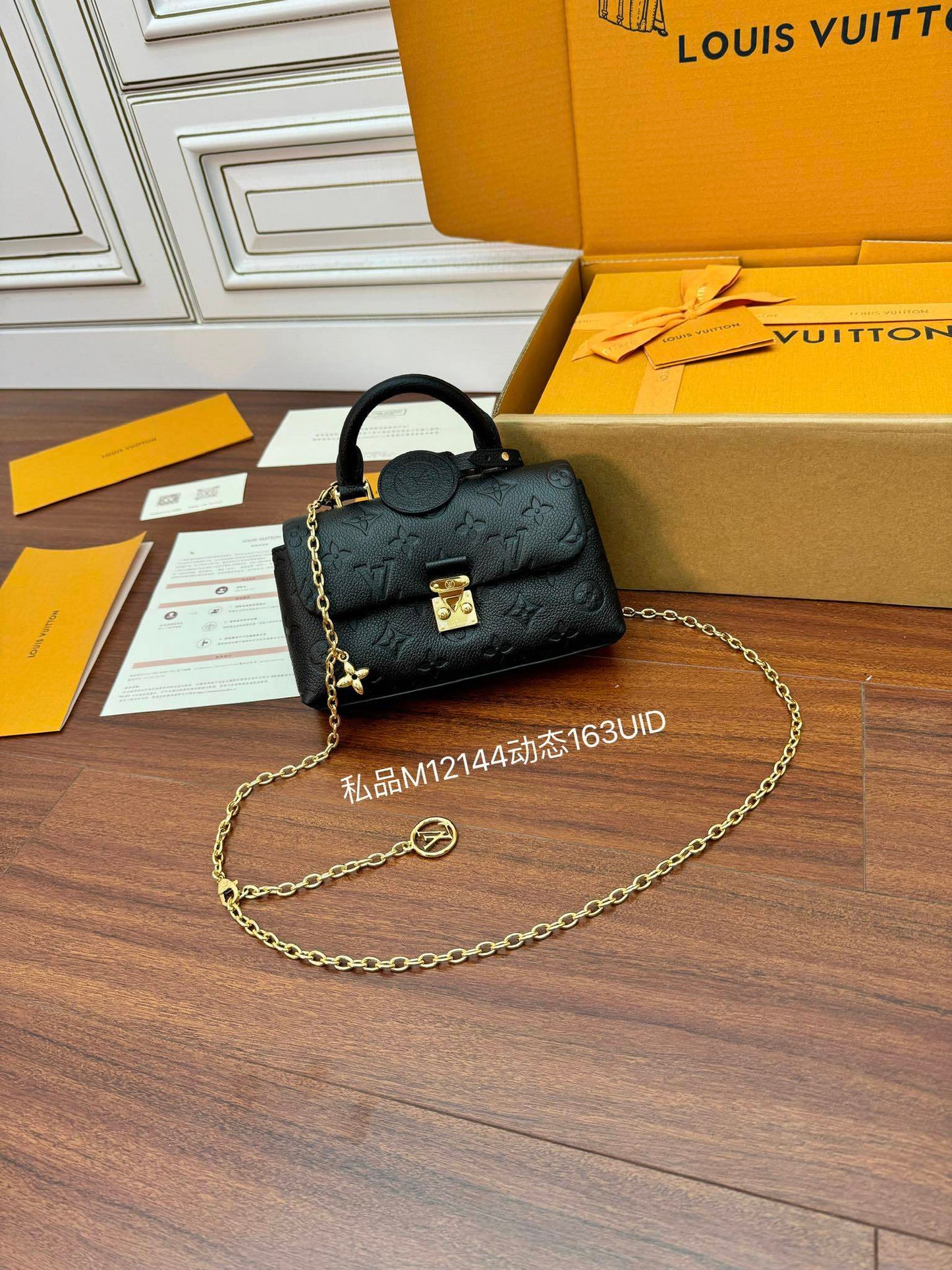 Louis Vuitton Nano Madeleine Bag in Black Monogram Empreinte Leather