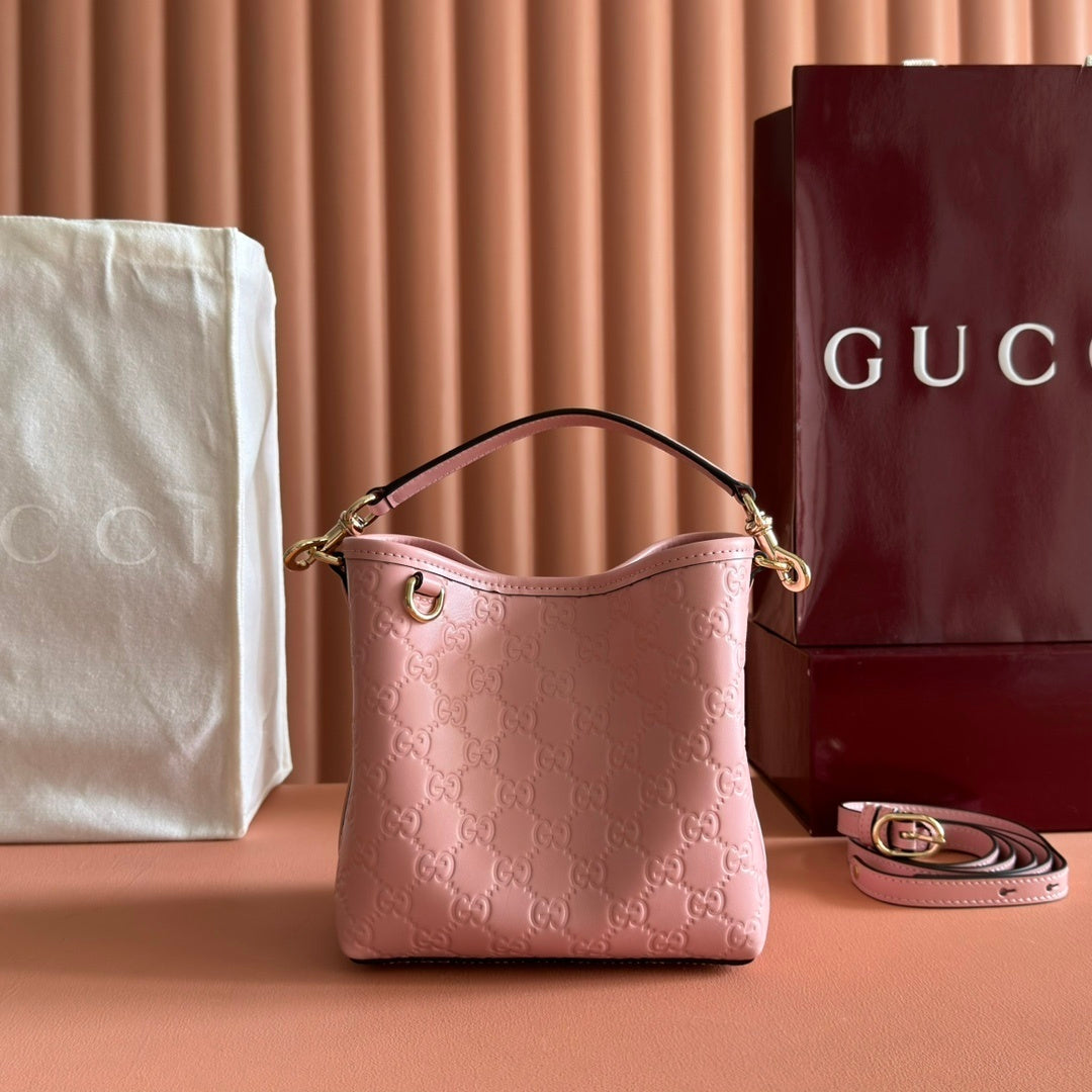 Gucci GG Emblem Small Bucket Bag in Pink Leather