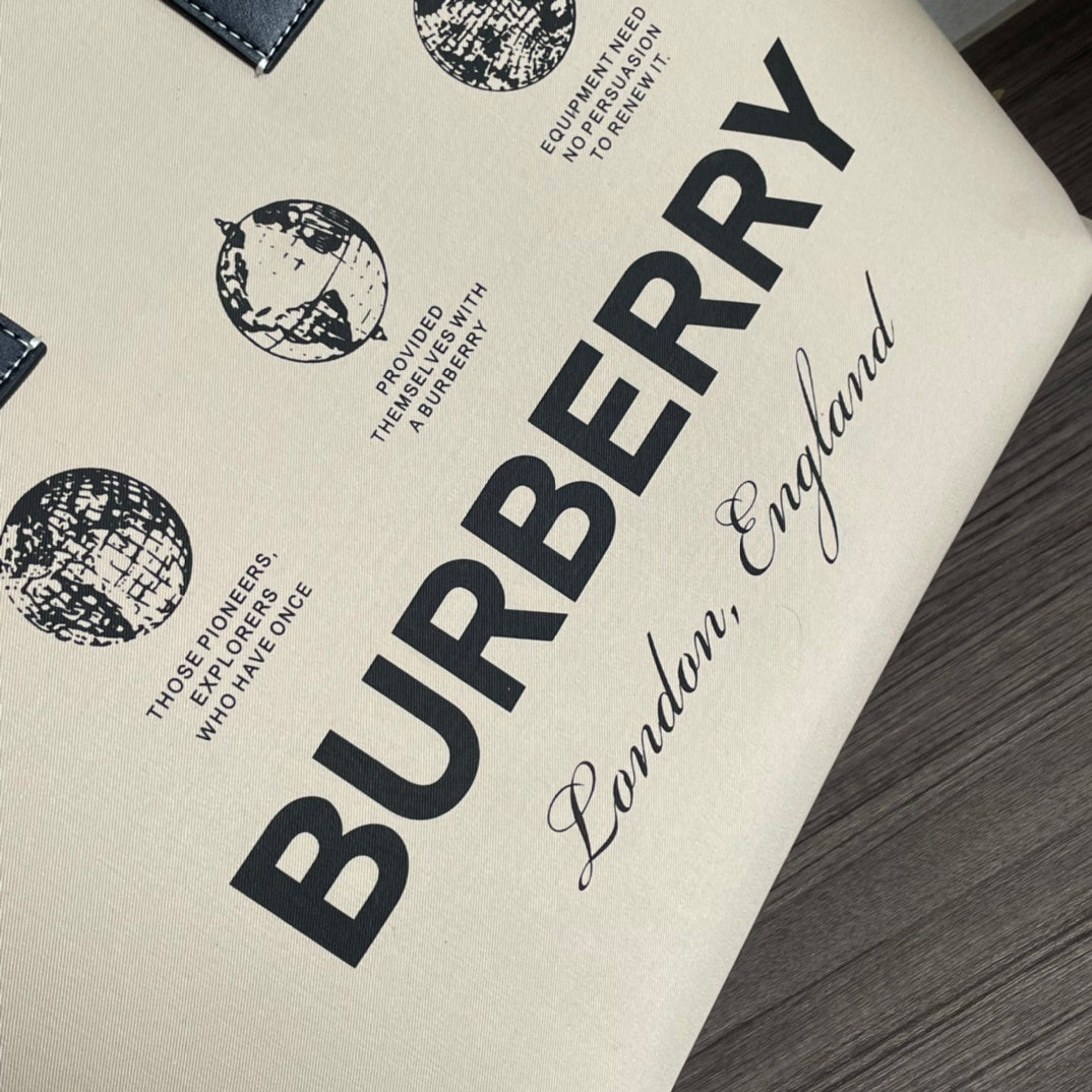 Burberry Label Print Cotton Medium London Tote Bag in beige and black, featuring leather trim and contrast stitching