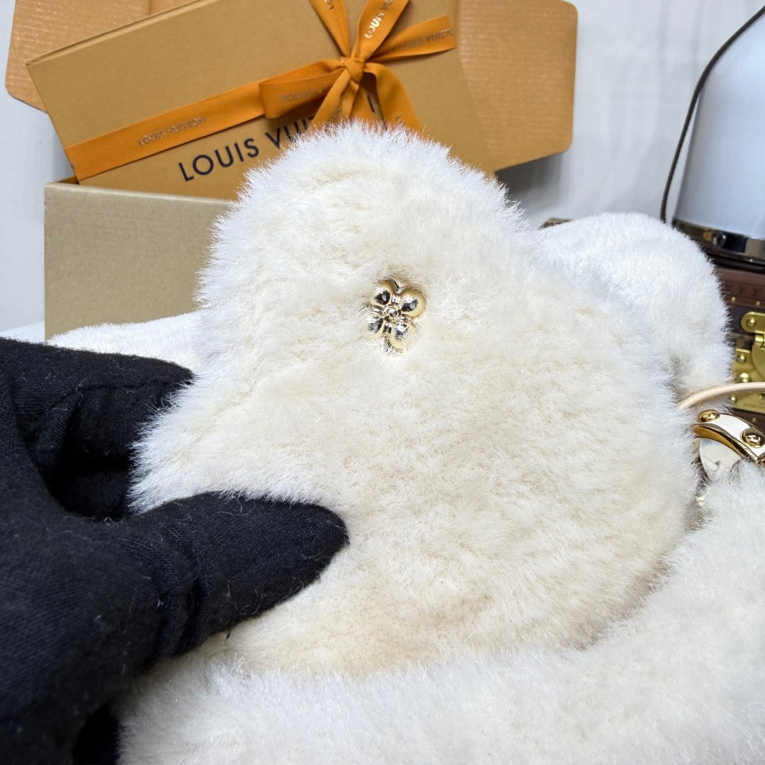 Louis Vuitton Capusnow Top-Handle Bag in Shearling with Removable Pompom Charm