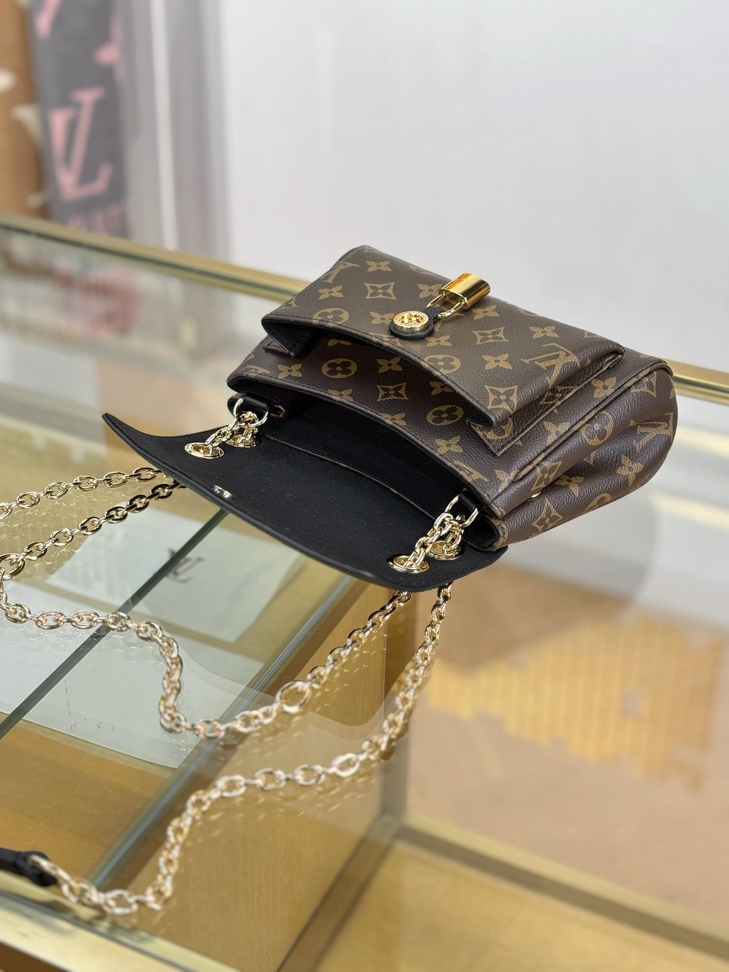 Louis Vuitton Saint Germain BB Bag in Monogram Canvas with Black Leather Trim & Gold Padlock