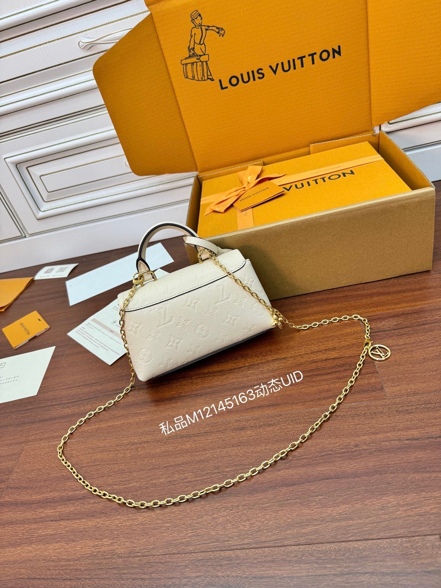 Louis Vuitton Nano Madeleine Bag in Crème Monogram Empreinte Leather