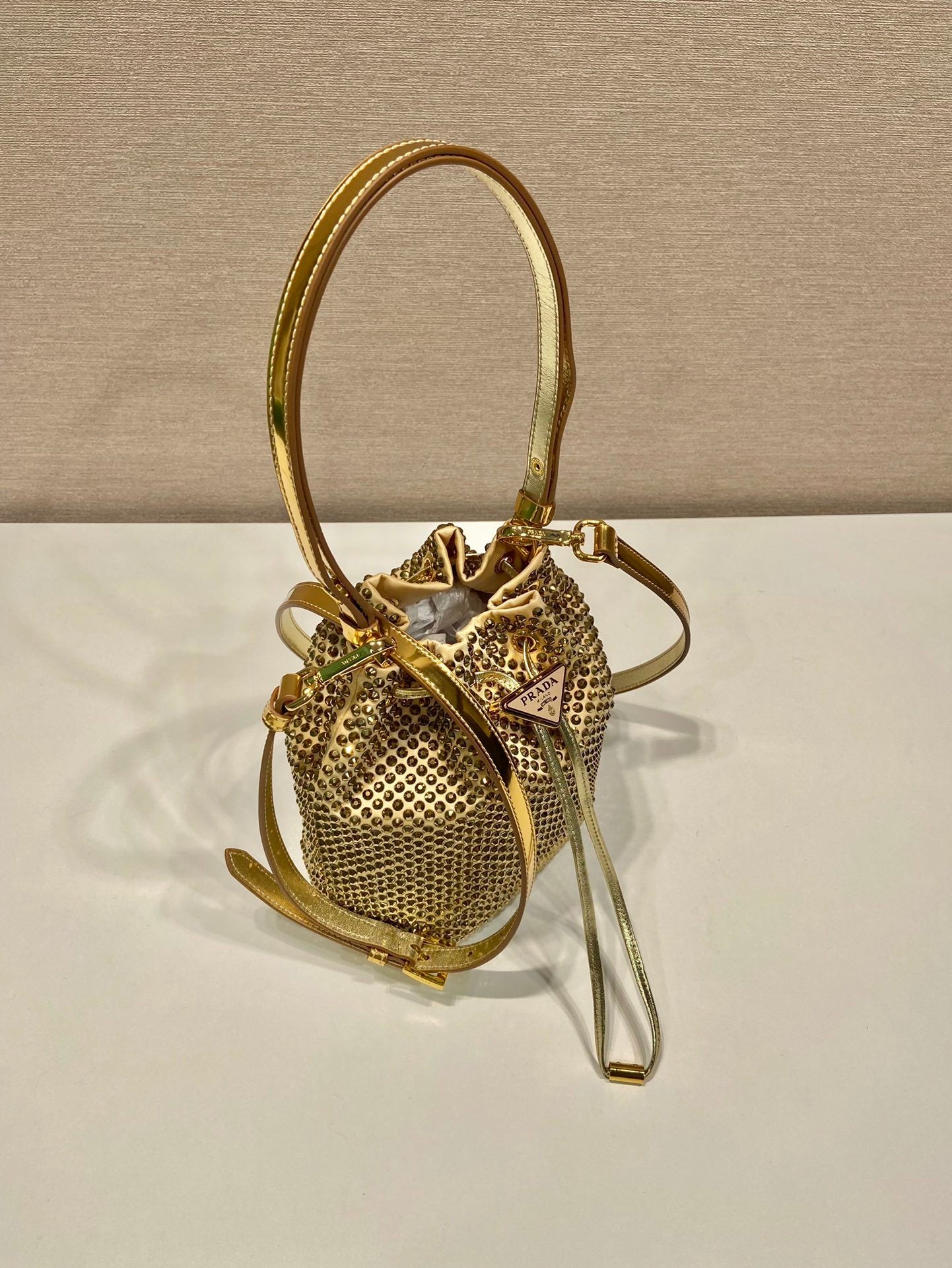 Prada Crystal-Embellished Gold Silk Bucket Bag