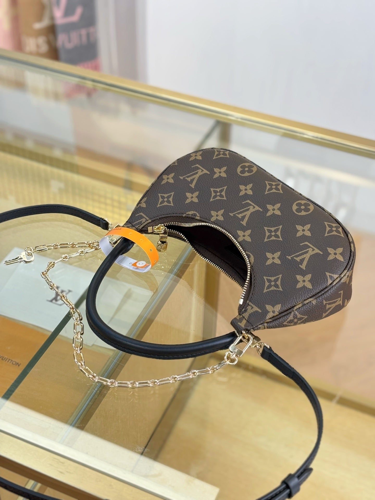 Louis Vuitton Catchy PM Bag – Monogram Canvas with Black Leather Trim & Gold Hardware