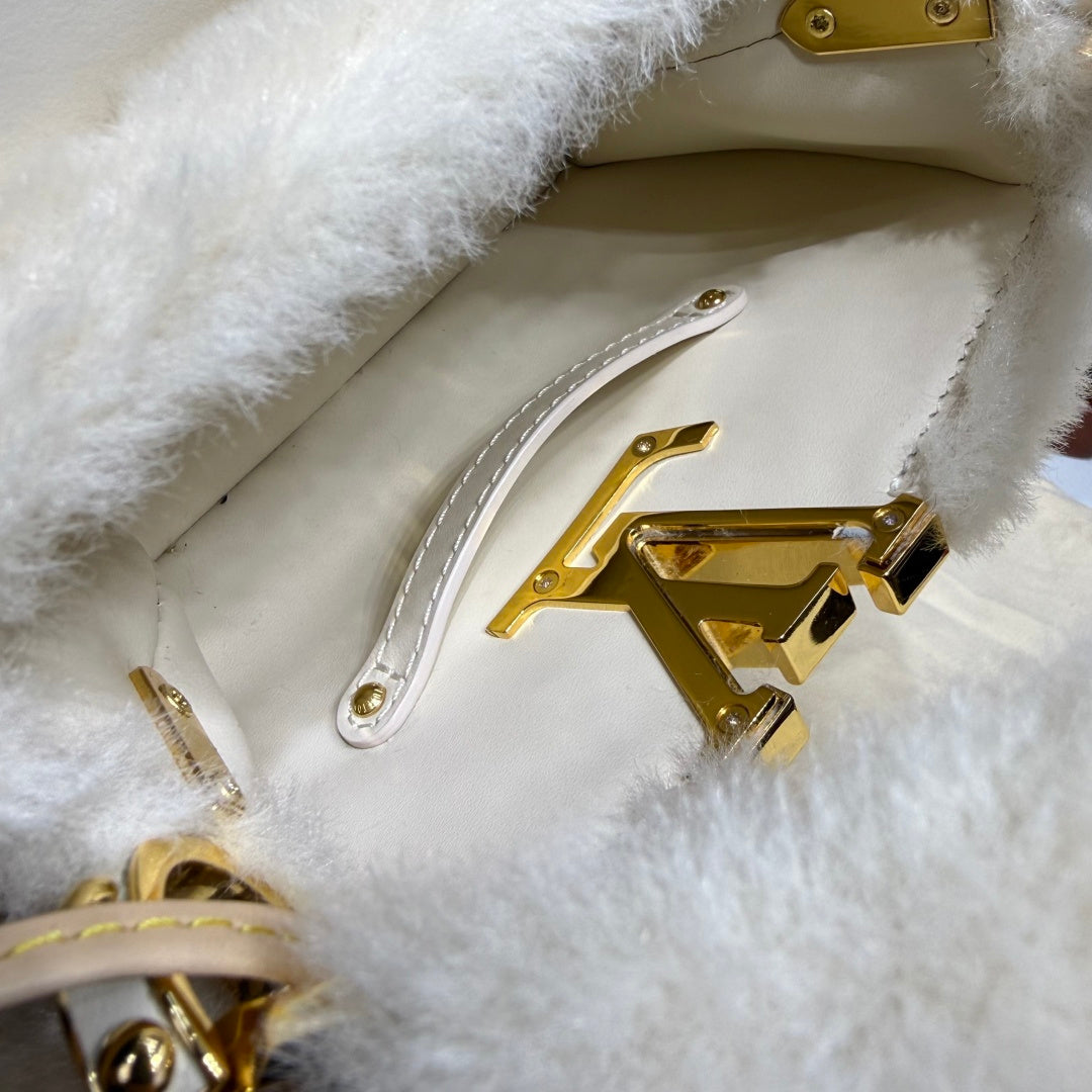 Louis Vuitton Capusnow Top-Handle Bag in Shearling with Removable Pompom Charm
