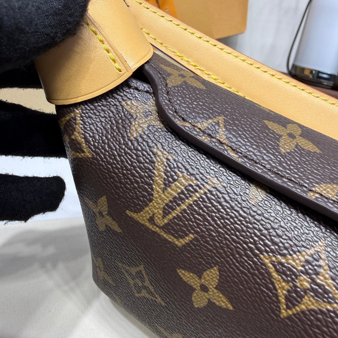 Louis Vuitton Pochette Mia Bag in Monogram Canvas