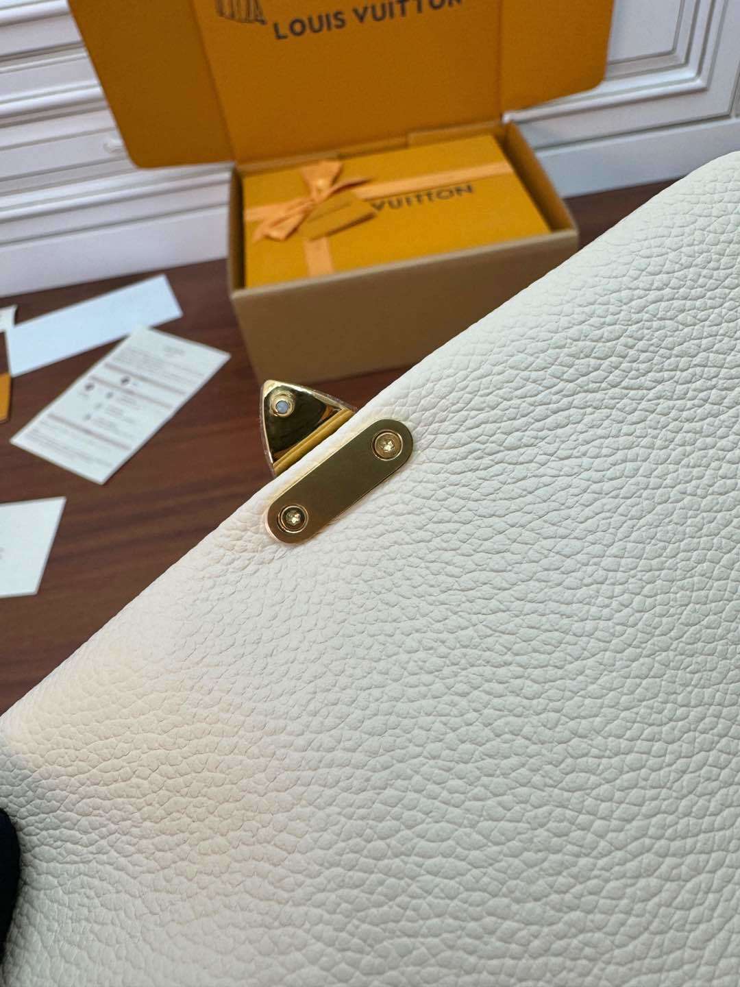 Louis Vuitton Nano Madeleine Bag in Crème Monogram Empreinte Leather