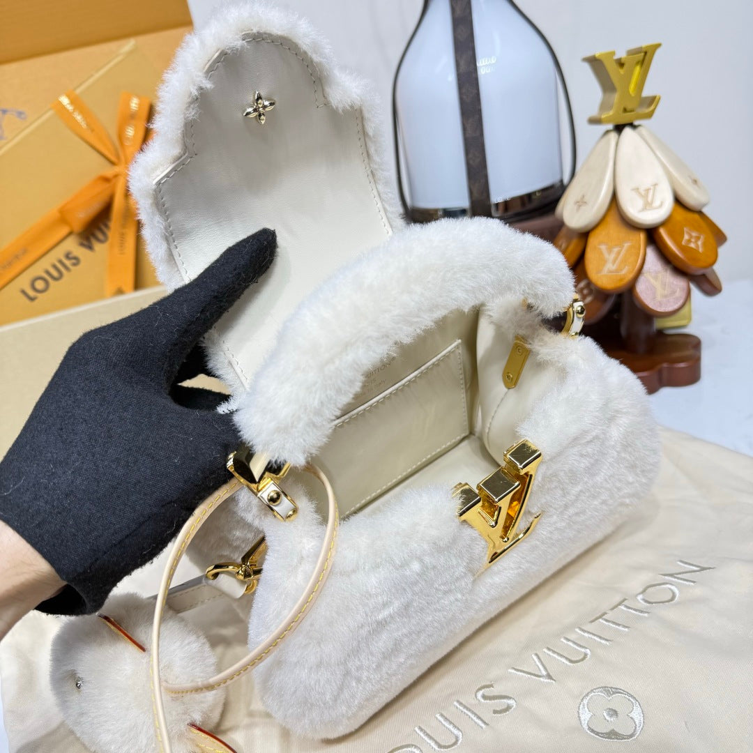 Louis Vuitton Capusnow Top-Handle Bag in Shearling with Removable Pompom Charm