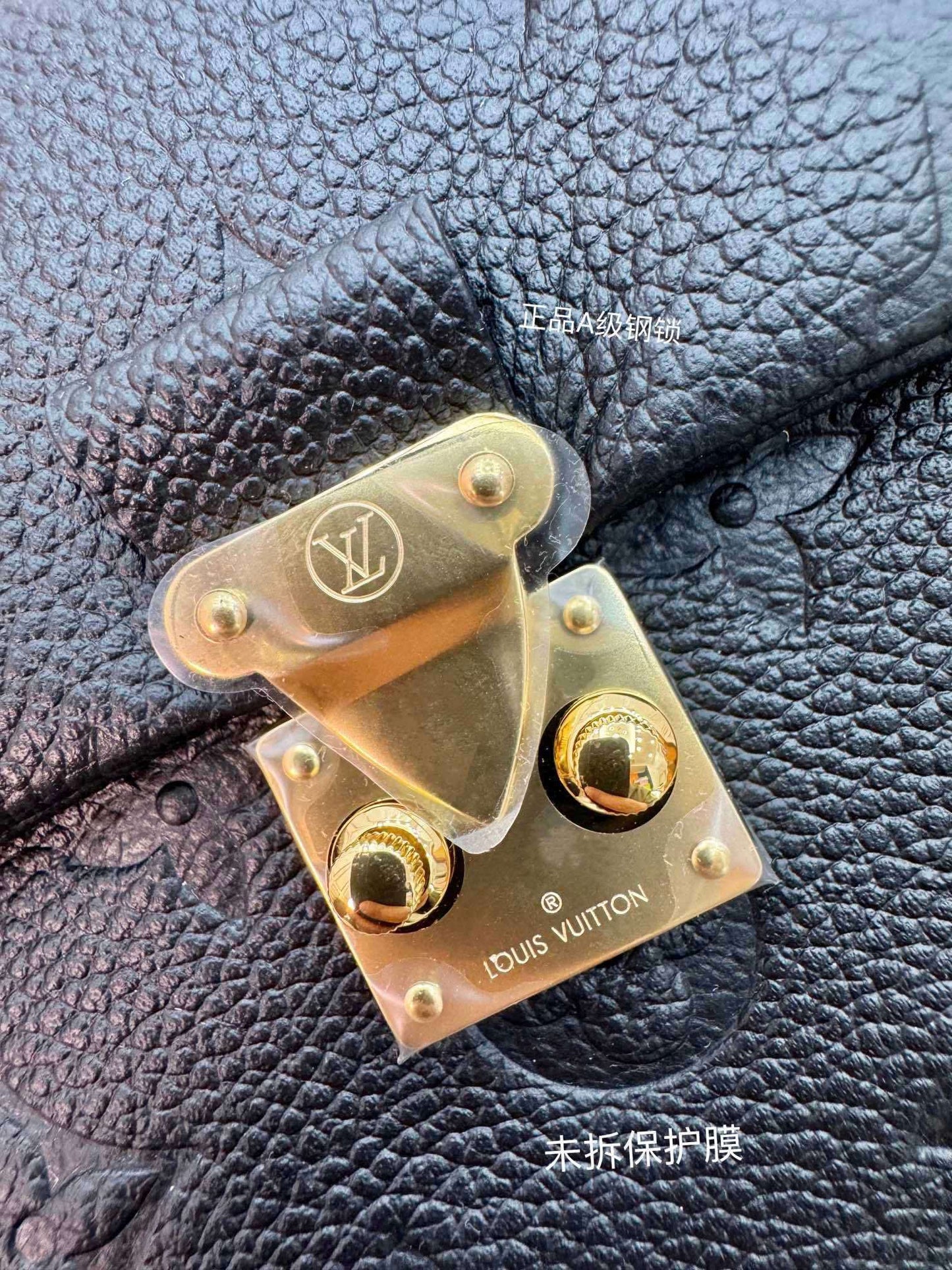 Louis Vuitton Nano Madeleine Bag in Black Monogram Empreinte Leather