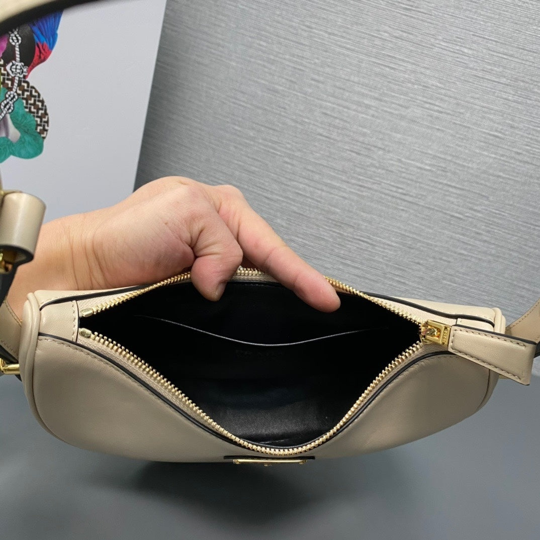 Prada Arqué Calfskin Leather Shoulder Bag – Crescent Shape with Top Zip