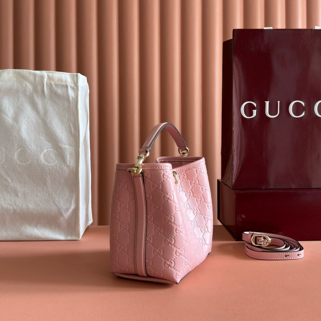 Gucci GG Emblem Small Bucket Bag in Pink Leather