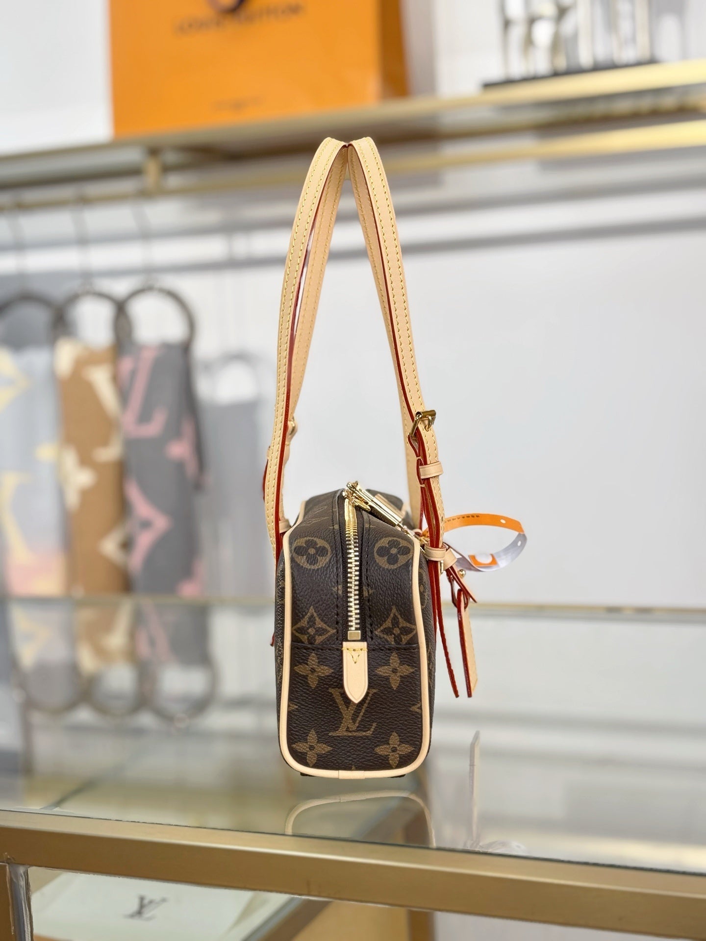 Louis Vuitton Hang On Handbag – Classic Monogram Canvas with Natural Cowhide Leather Trim