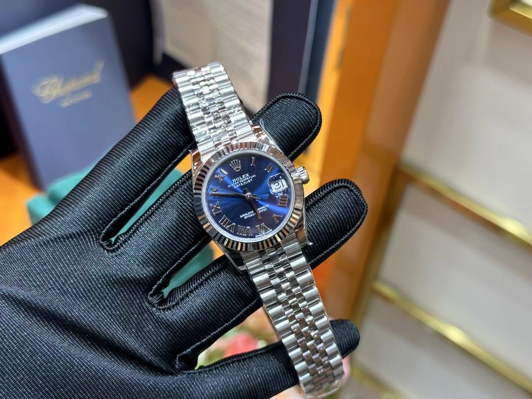 Rolex Datejust – Blue Dial with Roman Numerals, White Gold Fluted Bezel & Steel Jubilee Bracelet