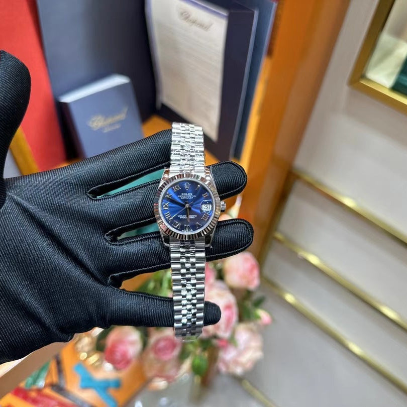 Rolex Datejust – Blue Dial with Roman Numerals, White Gold Fluted Bezel & Steel Jubilee Bracelet