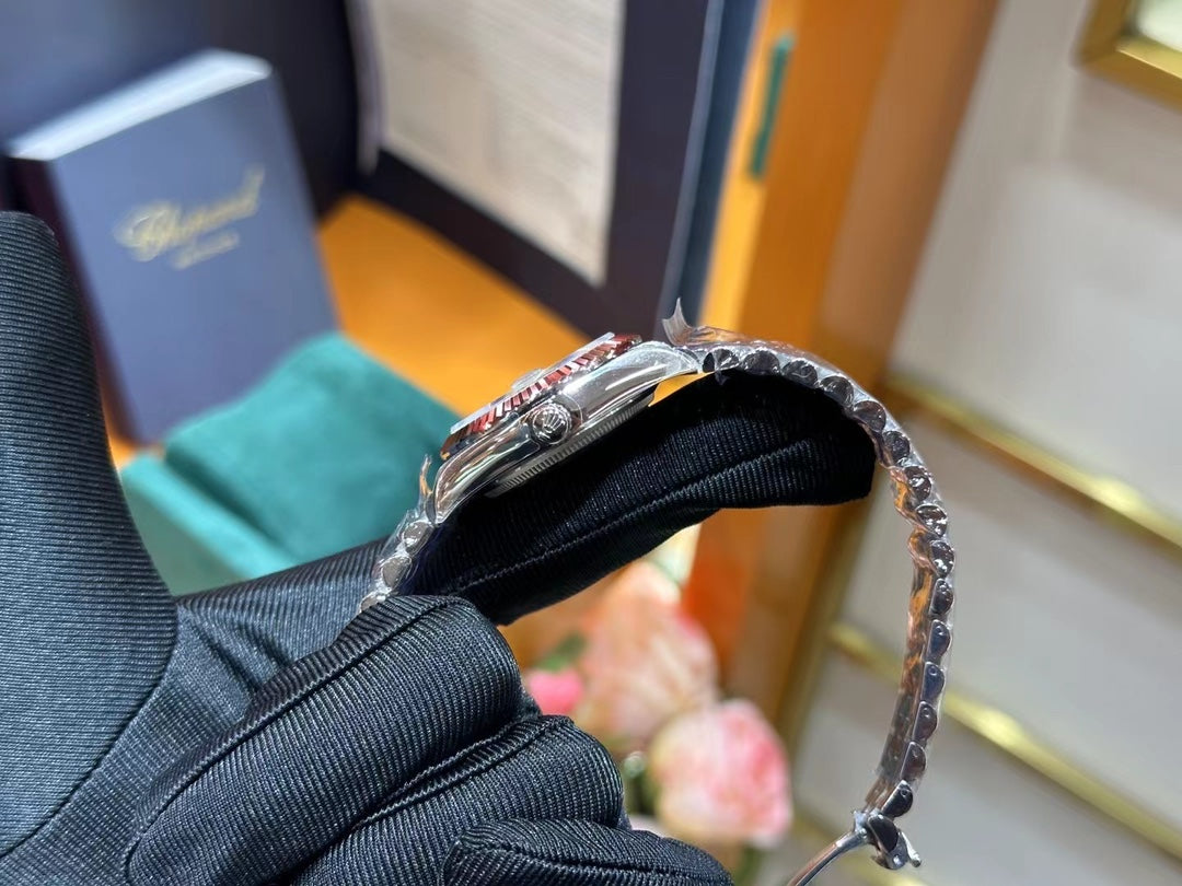 Rolex Datejust – Blue Dial with Roman Numerals, White Gold Fluted Bezel & Steel Jubilee Bracelet