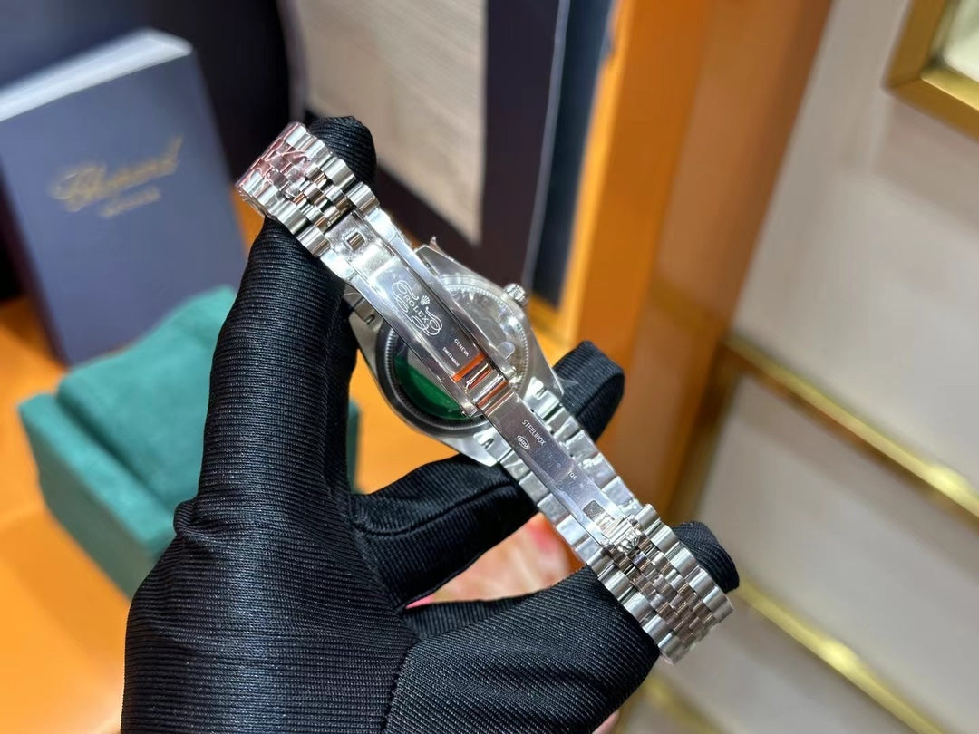 Rolex Datejust – Blue Dial with Roman Numerals, White Gold Fluted Bezel & Steel Jubilee Bracelet