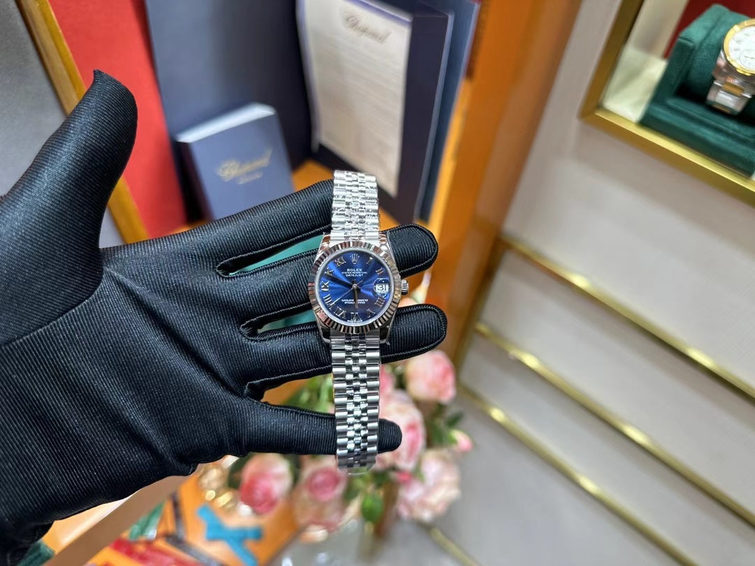 Rolex Datejust – Blue Dial with Roman Numerals, White Gold Fluted Bezel & Steel Jubilee Bracelet