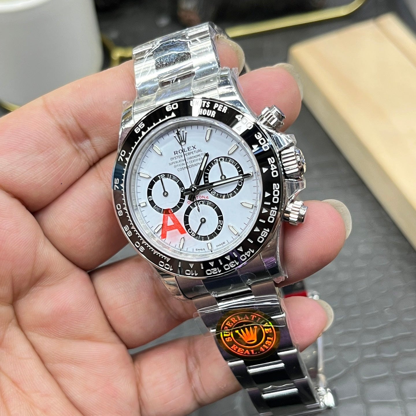 Rolex Cosmograph Daytona in Oystersteel with White Dial and Black Cerachrom Bezel