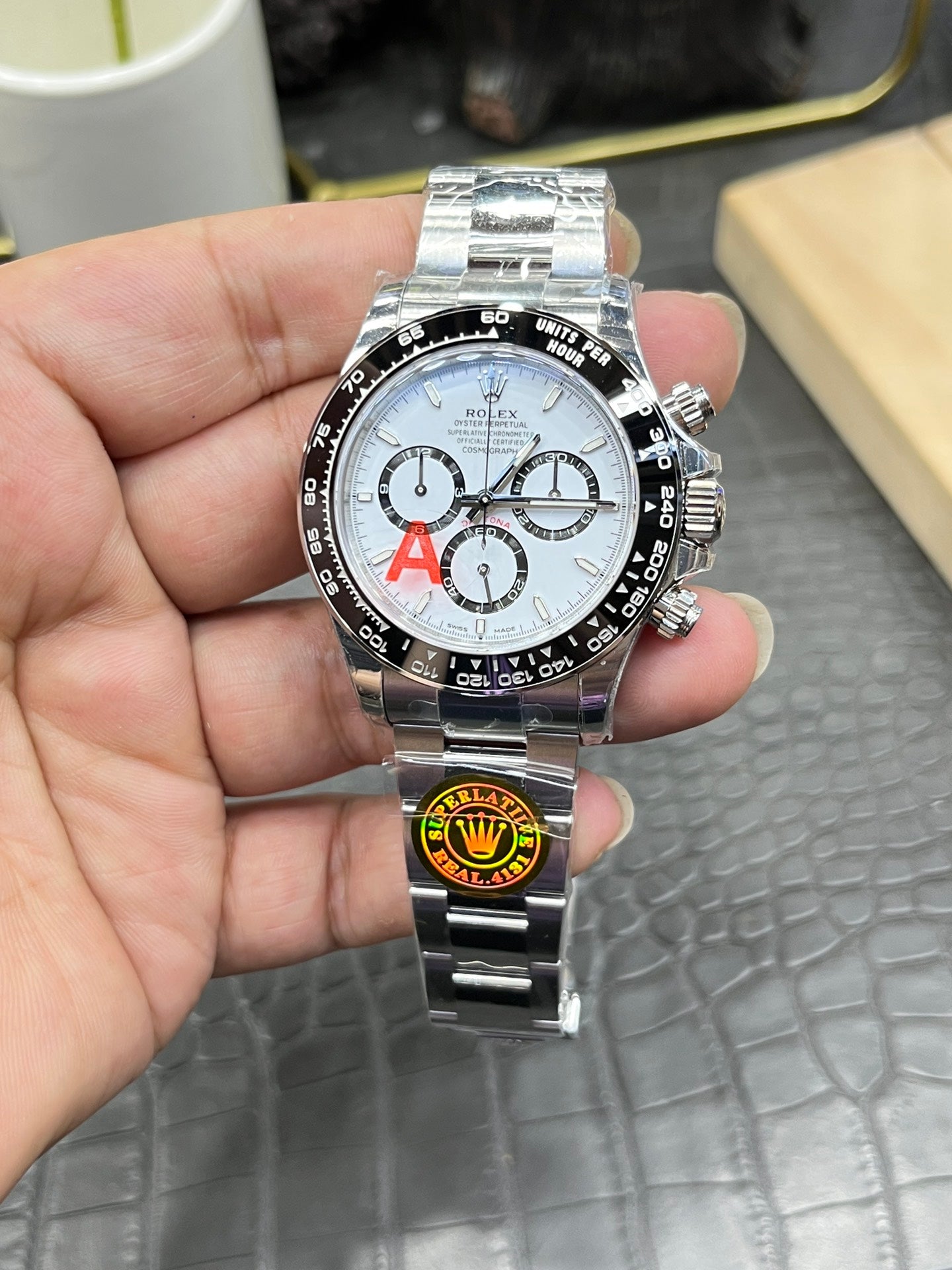Rolex Cosmograph Daytona in Oystersteel with White Dial and Black Cerachrom Bezel