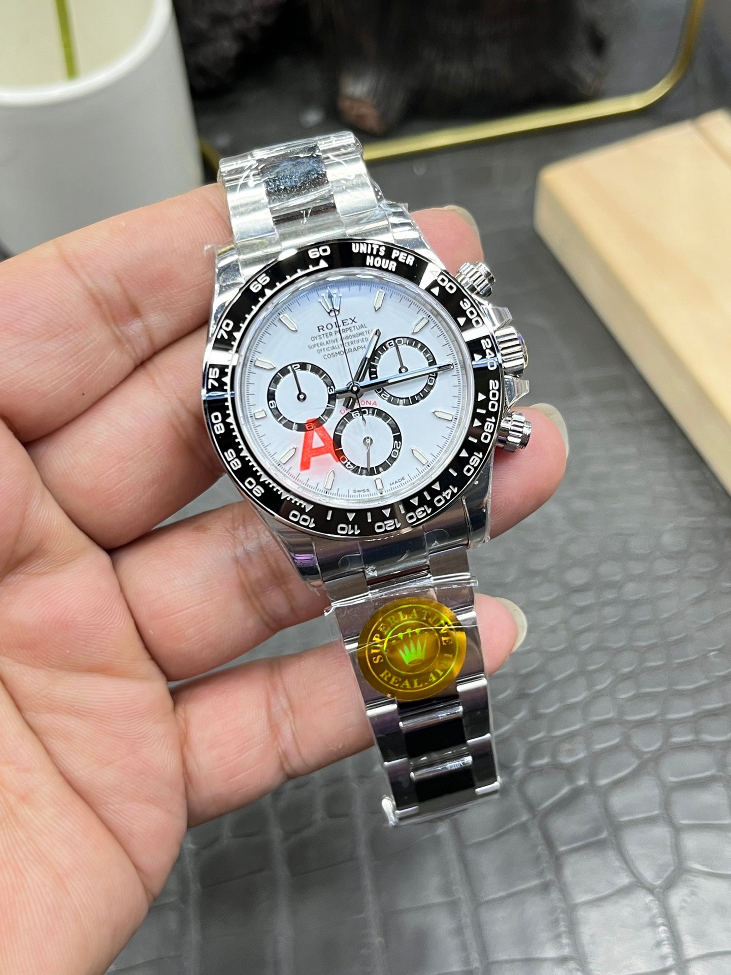 Rolex Cosmograph Daytona in Oystersteel with White Dial and Black Cerachrom Bezel