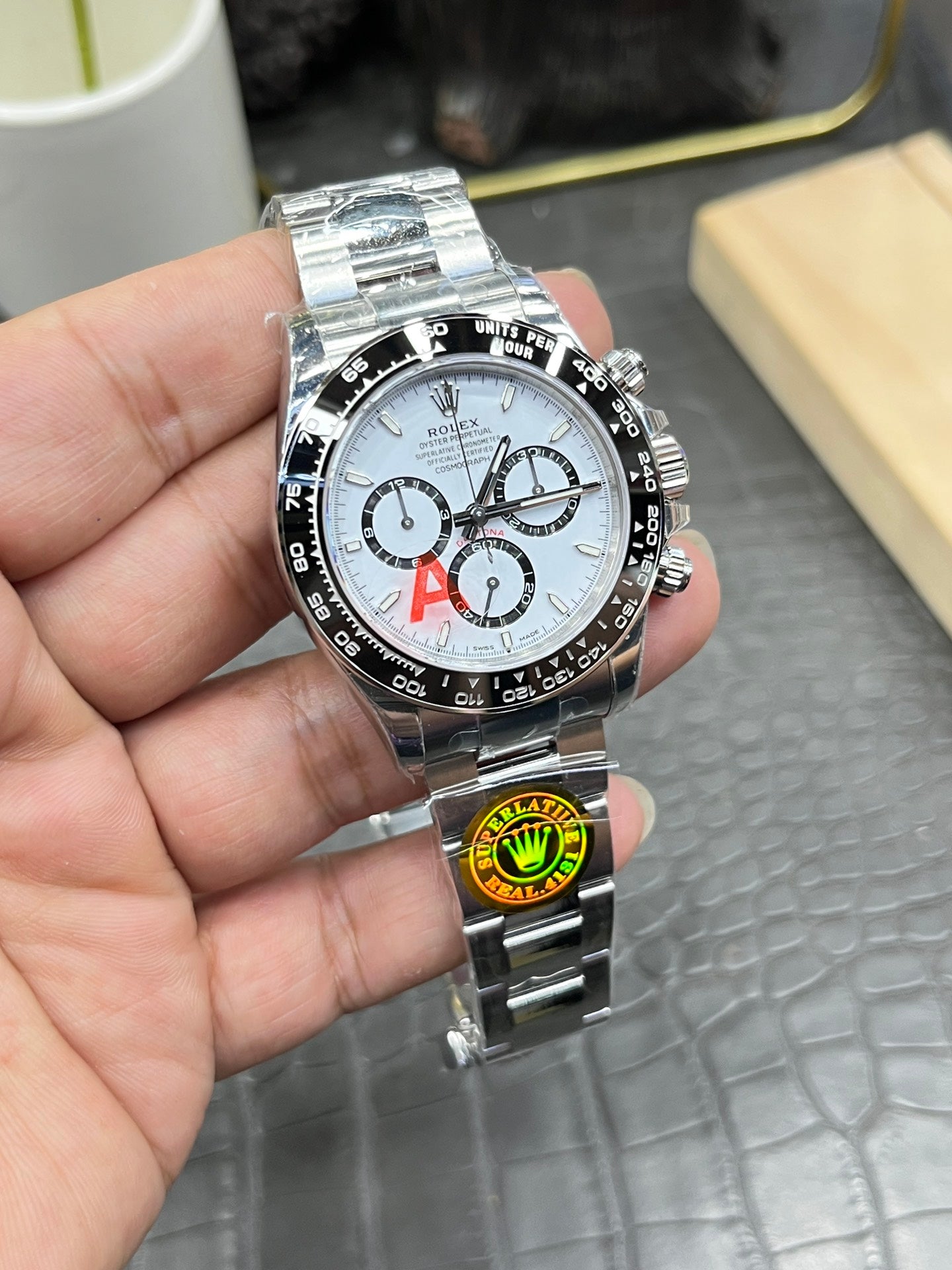 Rolex Cosmograph Daytona in Oystersteel with White Dial and Black Cerachrom Bezel