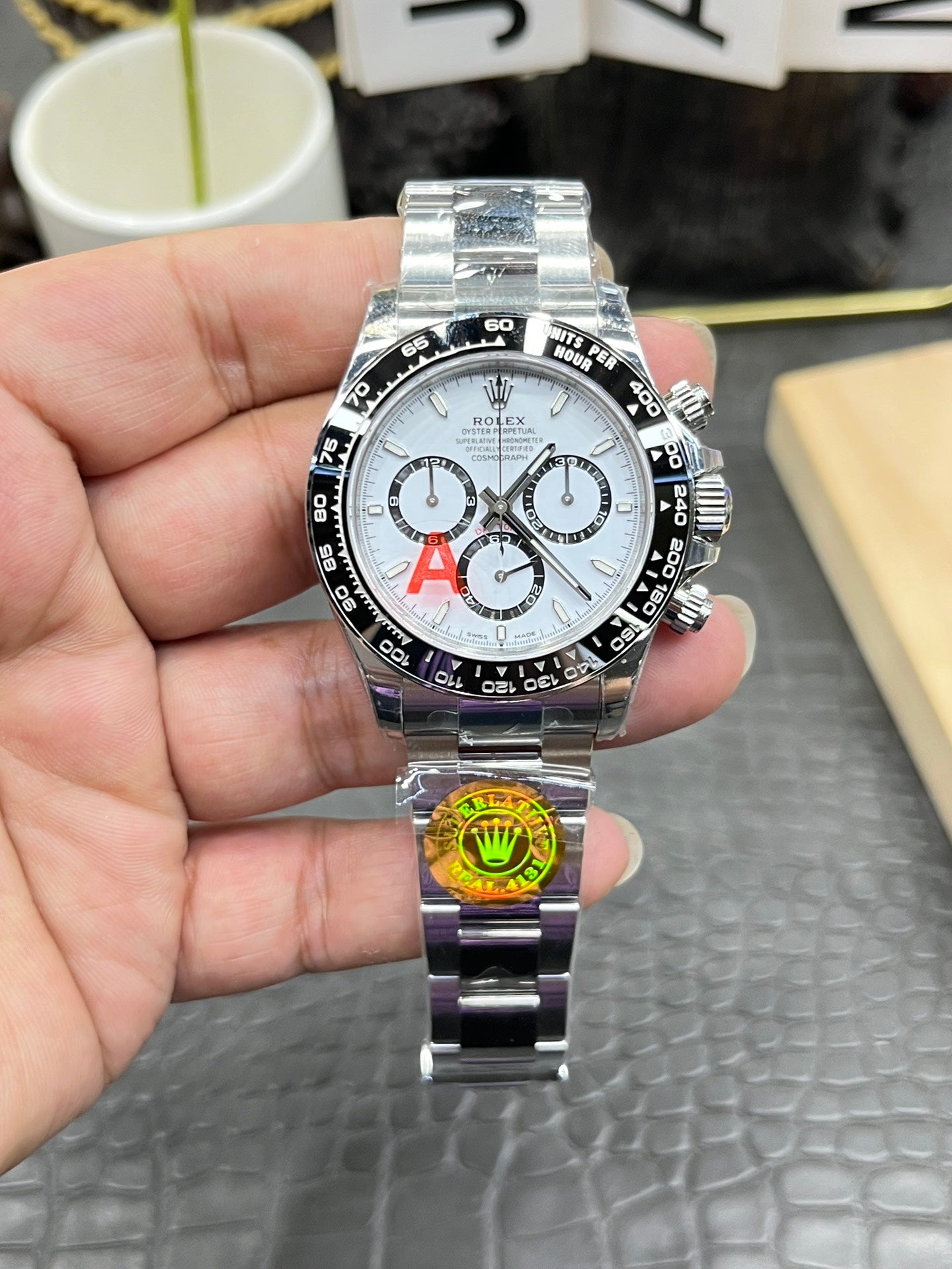 Rolex Cosmograph Daytona in Oystersteel with White Dial and Black Cerachrom Bezel