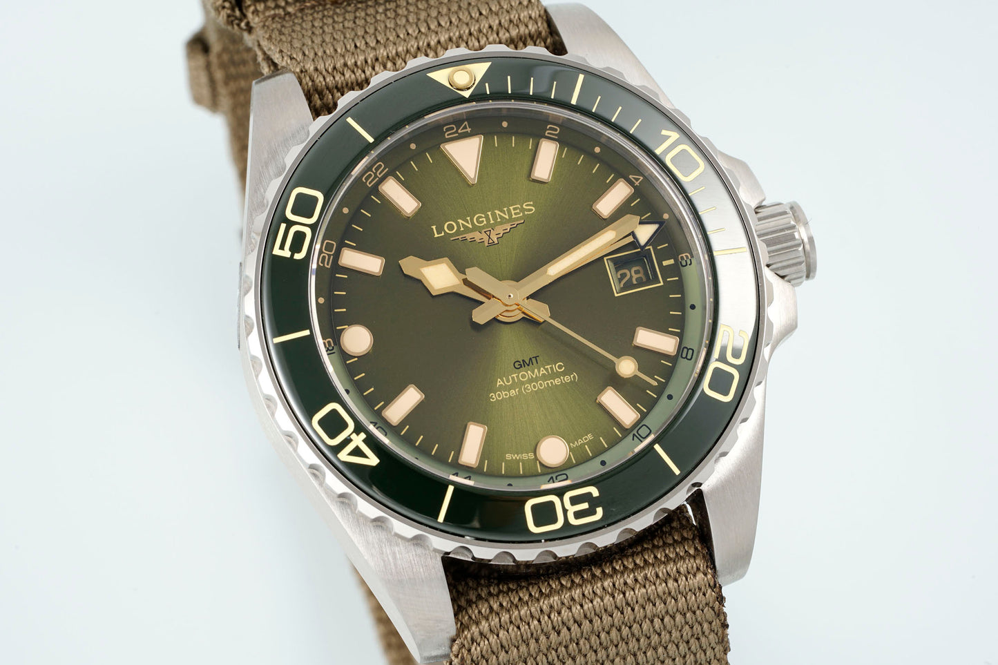 Longines HydroConquest GMT – Green Sunray Dial with Ceramic Bezel & Brown NATO Strap