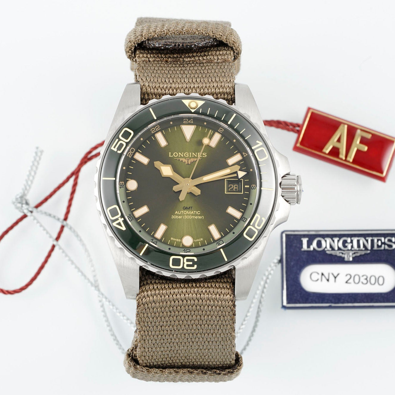 Longines HydroConquest GMT – Green Sunray Dial with Ceramic Bezel & Brown NATO Strap