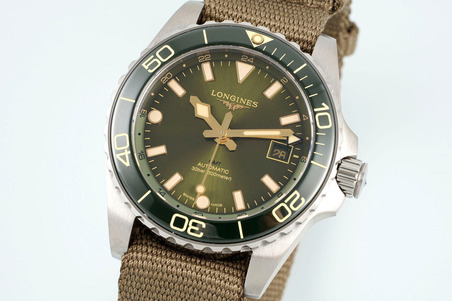 Longines HydroConquest GMT – Green Sunray Dial with Ceramic Bezel & Brown NATO Strap