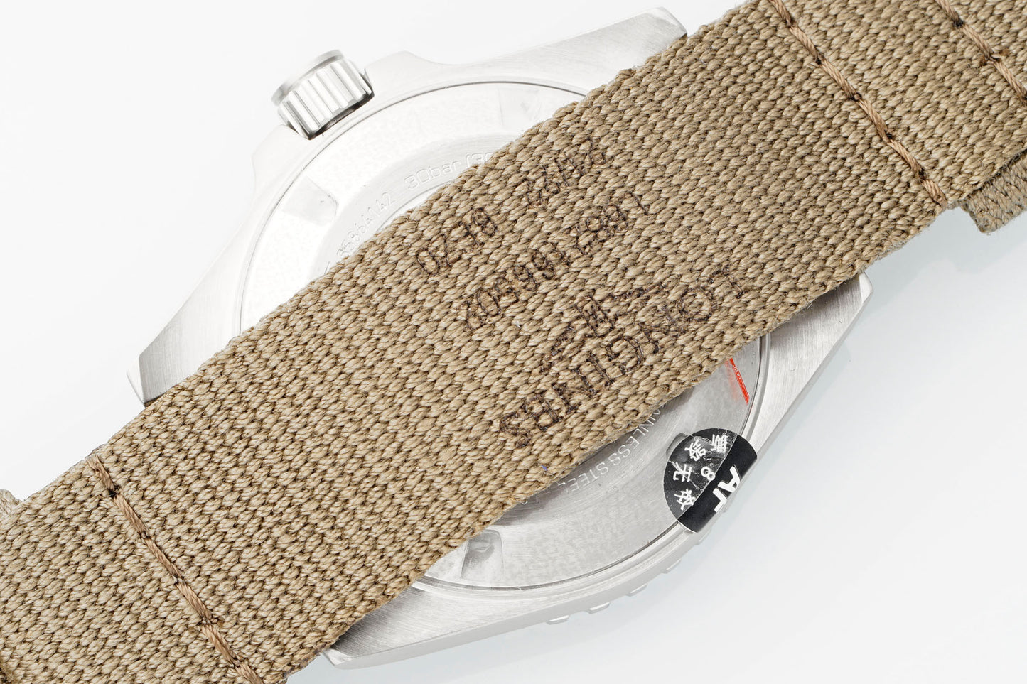 Longines HydroConquest GMT – Green Sunray Dial with Ceramic Bezel & Brown NATO Strap