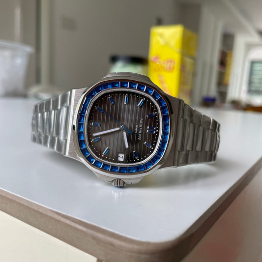 Patek Philippe Nautilus 5711/111P-001 Platinum Watch with Blue Sapphire Bezel