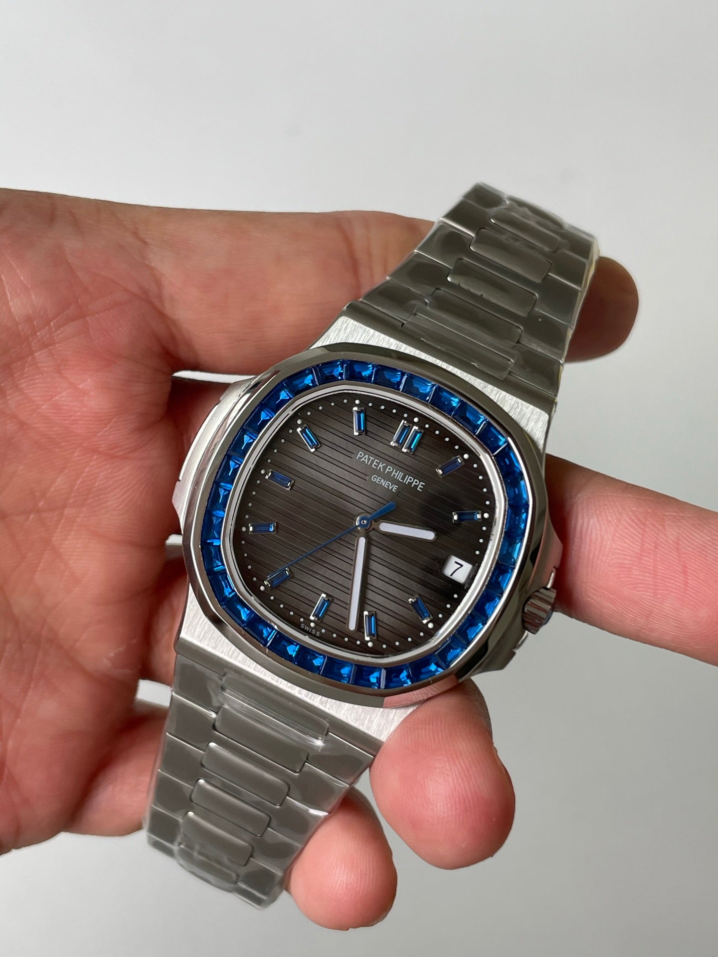 Patek Philippe Nautilus 5711/111P-001 Platinum Watch with Blue Sapphire Bezel