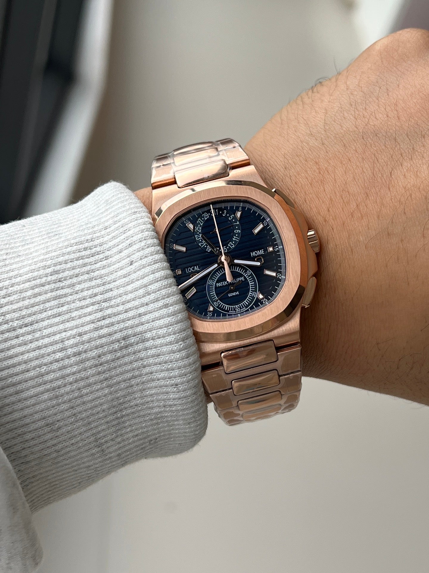 Patek Philippe Nautilus Travel Time Chronograph 5990/1R-001 in Rose Gold with Blue Sunburst Dial