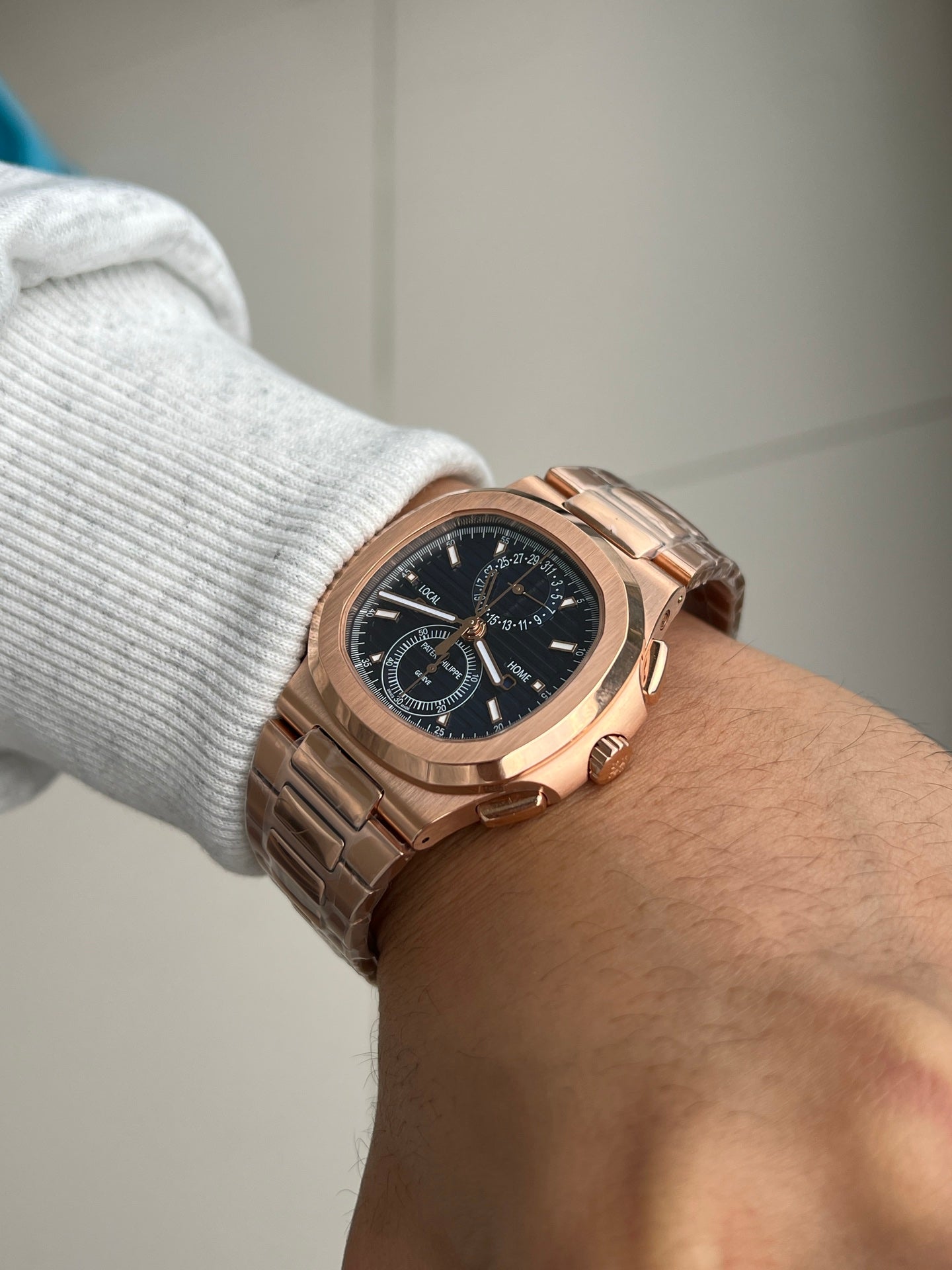 Patek Philippe Nautilus Travel Time Chronograph 5990/1R-001 in Rose Gold with Blue Sunburst Dial