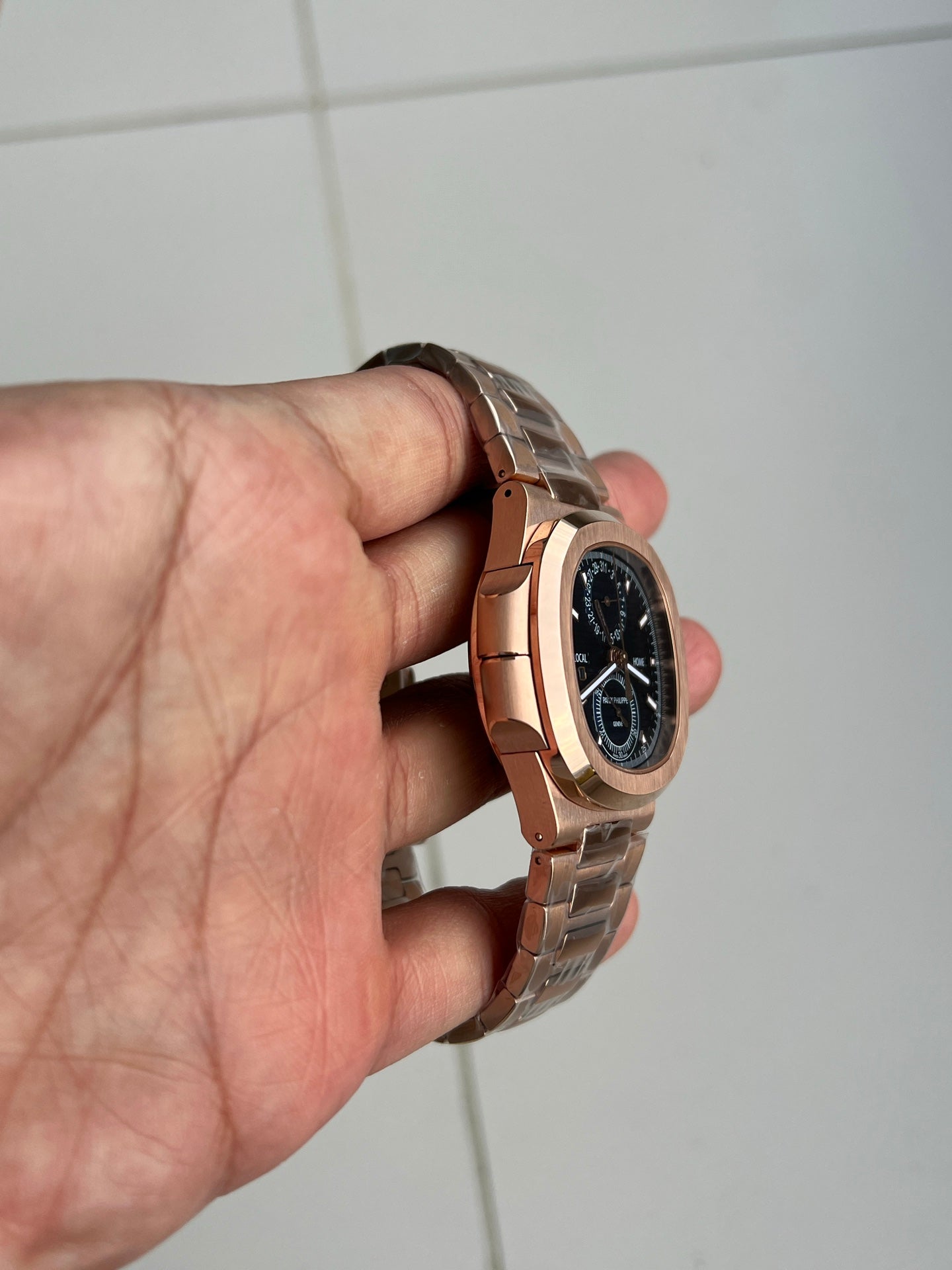 Patek Philippe Nautilus Travel Time Chronograph 5990/1R-001 in Rose Gold with Blue Sunburst Dial